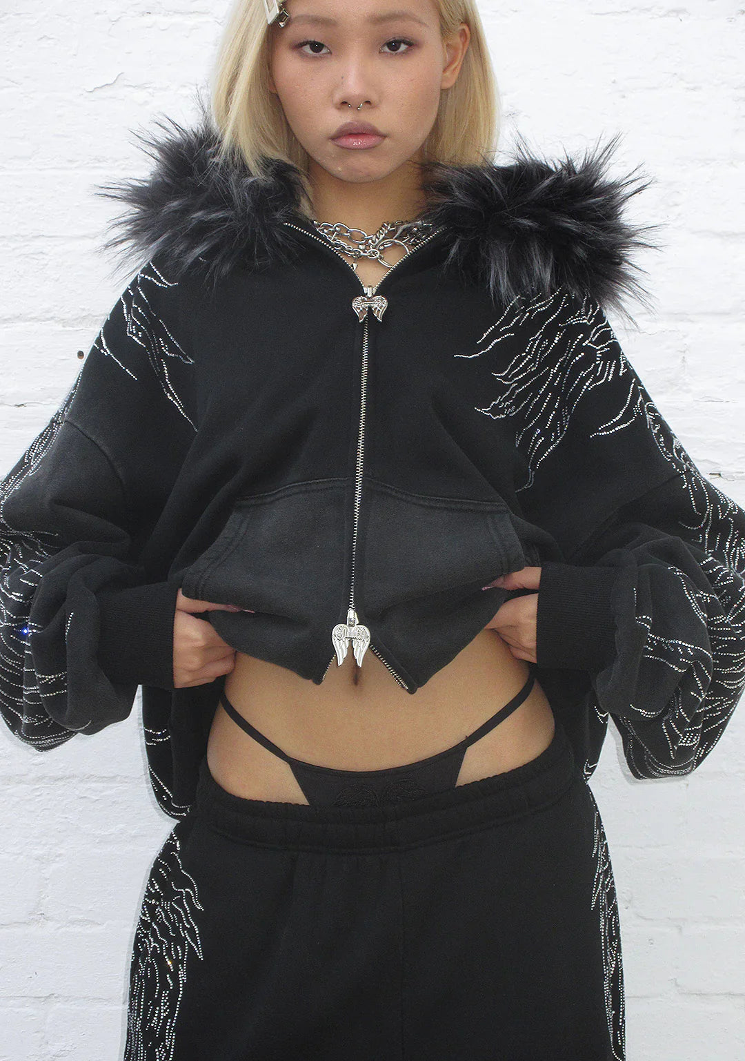 https://cdn.shopify.com/s/files/1/0789/4371/5581/files/fallen-faux-fu-rhinestone-zip-hoodie-washed-black-_detachable-fur_-4.webp?v=1766803226